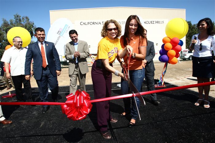 President Mildred GarcÃ­a cuts the ribbon to open Univision's Feria Es El Momento with Maelia Macin, general manager of Univision Los Angeles (at right). Pictured at left: California Lt. Gov. Abel Maldonado.