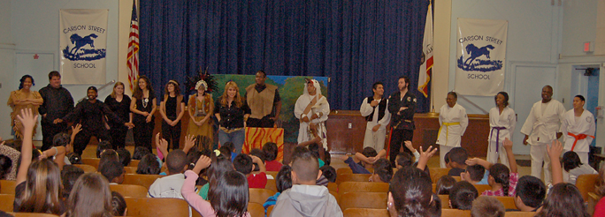 Elementary school students are entertained and enlightened by Teatro Dominguez's multicultural fables at Carson Street School