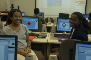Miranda Taylor, an 11th grader at Windward School in Mar Vista, Calif. and Jessica Taylor, a 10th grader at Rolling Hills Preparatory School, learn how to use Flash animation to design a video game. 