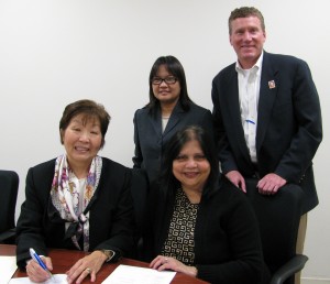 Patricia Quan and Mayuri Mody (L-R, seated), hope to grow a new generation of hand therapists with a gift for scholarships from the Hand Therapy Society of Greater Los Angeles. Pictured with Terry Peralta-Catipon, director, Master of Science in Occupational Therapy Program, and Greg Saks, vice president, University Advancement.