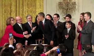 CSUDH President Mildred Garcia shakes President Barack Obama's hand