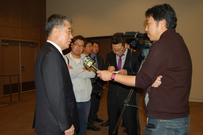 Korean Consul General Shin speaks to a reporter with LA18