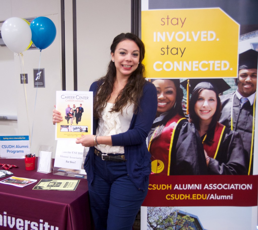 Alumni programs coordinator Felicia Hernandez greets alumni and makes sure soon-to-be graduates become a part of the alumni network.