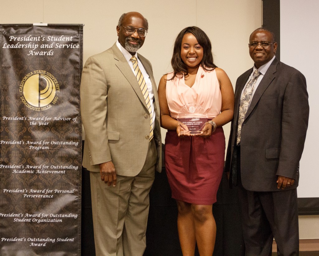 University Interim President Willie J. Hagan, Chardae Jenkins, and professor of Africana studies and newly appointed dean of the College of Arts and Humanities Munashe Furusa.