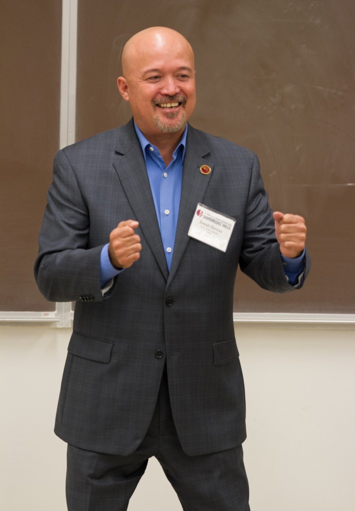 Joseph Herrera (Class of '99), vice president of human resources at AEG, fires up CSUDH students in an Introduction to Chicano Literature class.