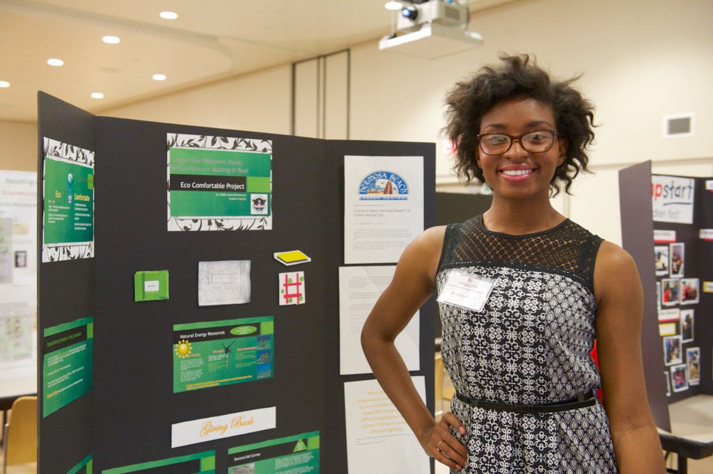 Brittney Ford, founder and CEO of the Eco Comfortable Project, displays her work at the Community Engagement symposium