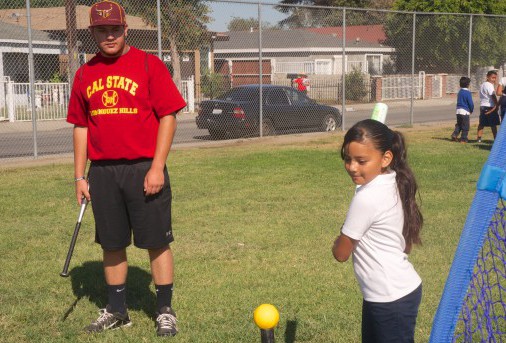 Tee-ball hitting lessons courtesy of CSUDH baseball player Kevin Lugo. 
