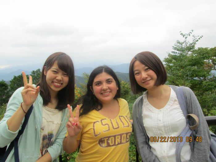 Laura Huerta (center) and new friends at Mount Takao, Japan.