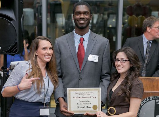 Psychology students Aimee Miller, Christopher Odudu, Lizzette Ceja and Kaitlin O’Brien nab a second place honor during Student Research Day (O’Brien not pictured).