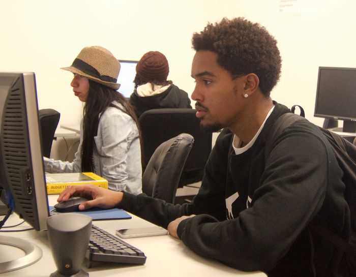 Students in the Toro Guardian Scholars program's computer lab 2