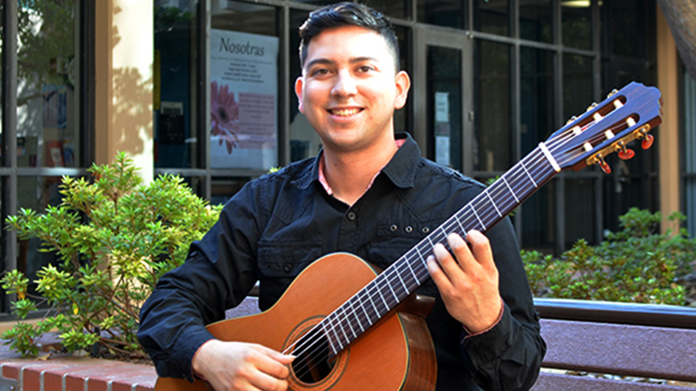 Carlos Bolivar with guitar