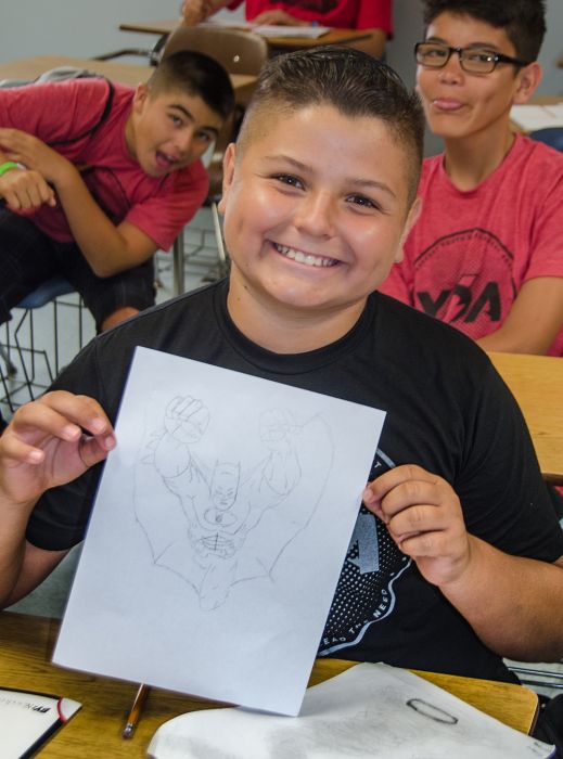 Noah Cabrera shares a drawing of his comic book character, Catman, during a Sharefest project focused on mentorship.