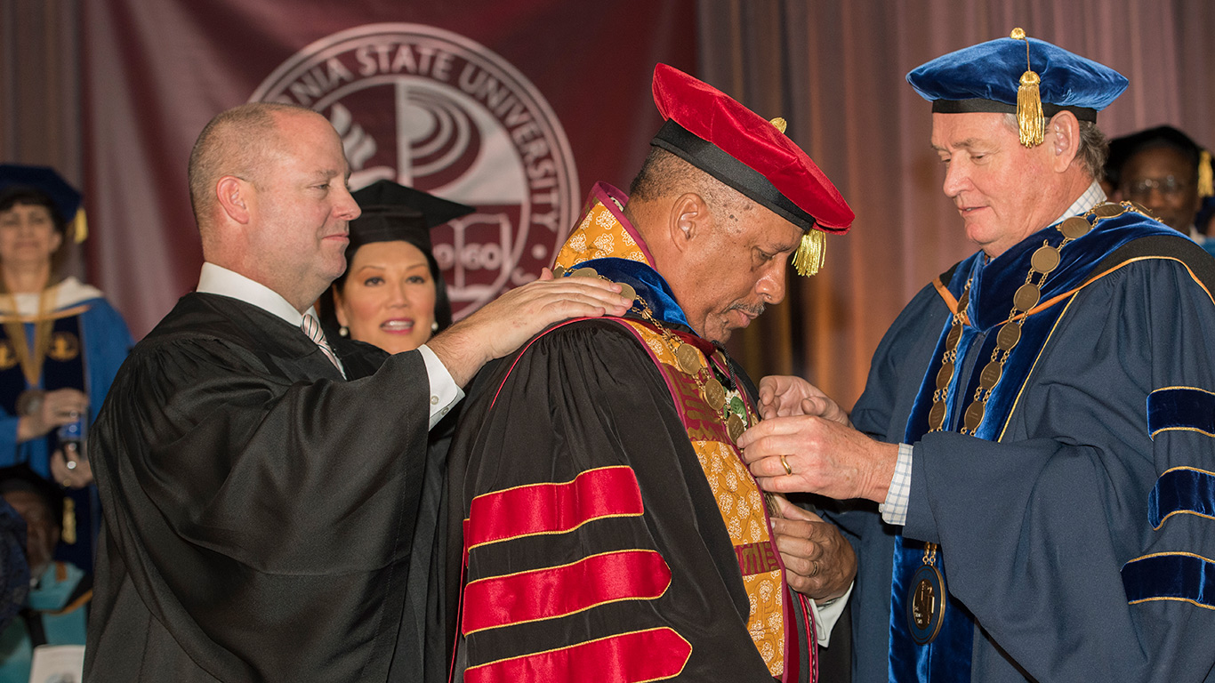 Thomas A. Parham is formally installed as president by CSU Chancellor Timothy P. White. (Left) CSU Trustee Adam Day. 
