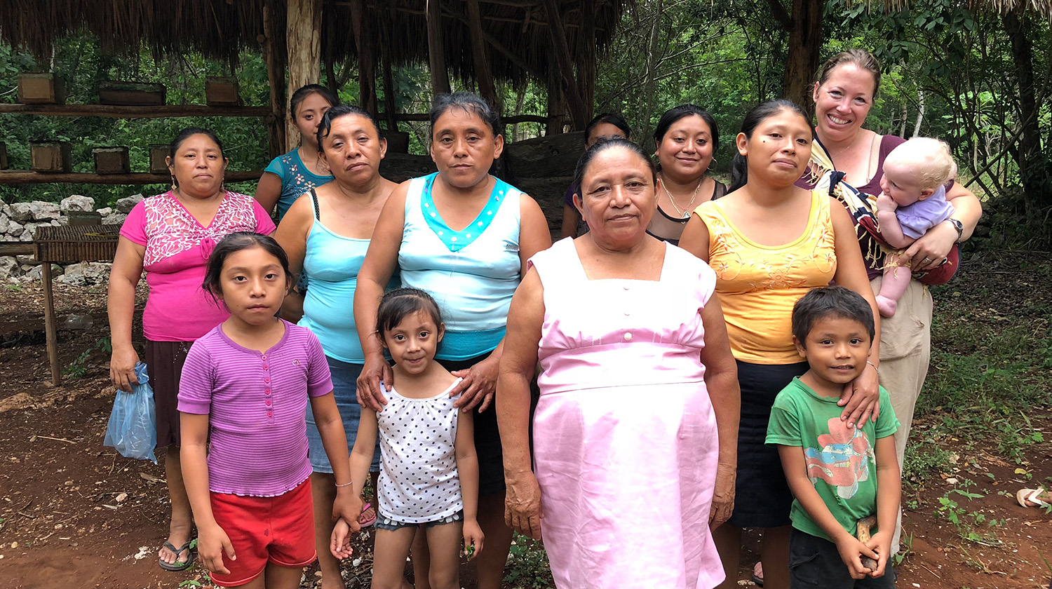 Sarah Taylor right with indigenous Maya women of Ek’ Balam on the Yucatán Peninsula.