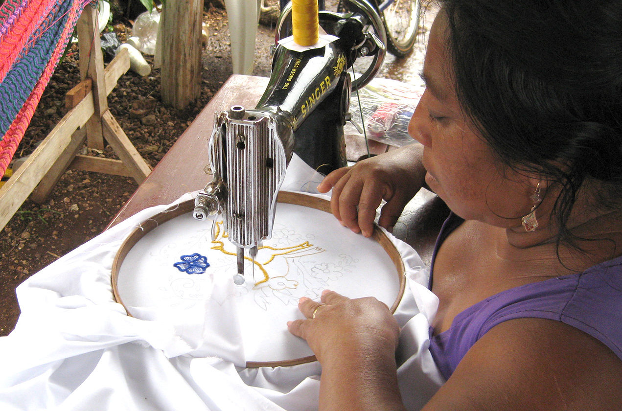 Maya women of Ek Balam sewing.