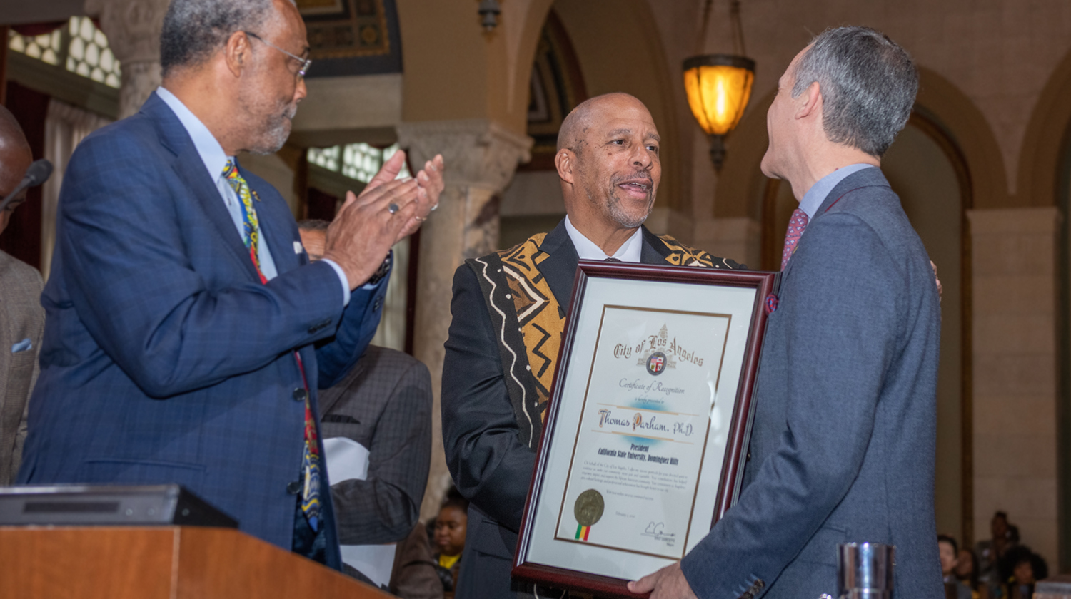 President Parham receives his Hall of Fame award from L.A. Mayor Eric Garcetti. 