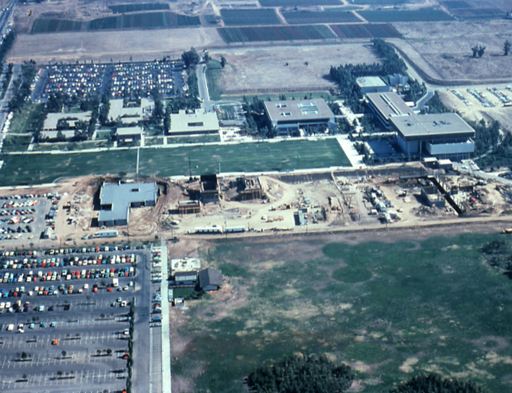 CSUDH Campus looking east. Includes construction of Student Health Center, University Theatre, and Humanities Building, ca. 1976