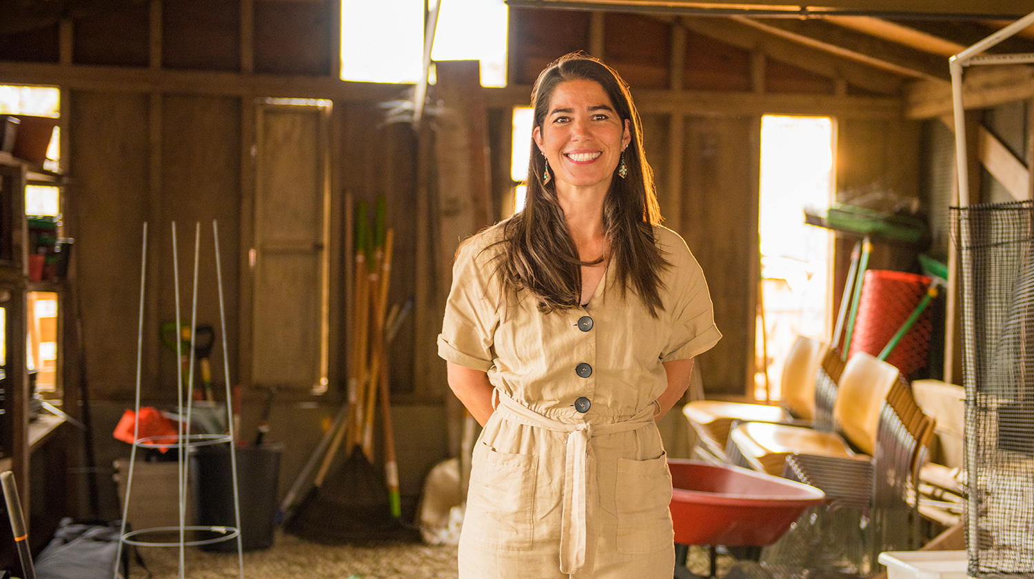 Jenney Hall stands in the shed at the Urban Farm that she co-founded at CSUDH in 2018. Hall has been honored with the 2020 Excellence in Service Award.