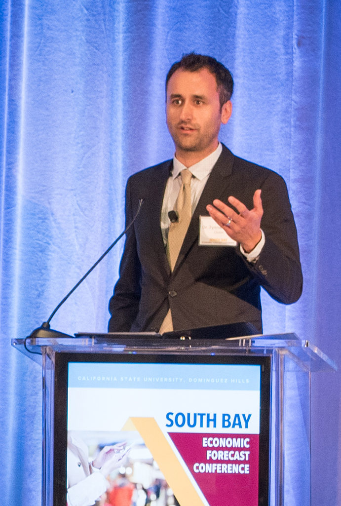 Fynnwin Prager presents during CSUDHs annual South Bay Economic Forecast.