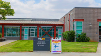 Campus Vaccine Clinic Sign at Extended Education Building