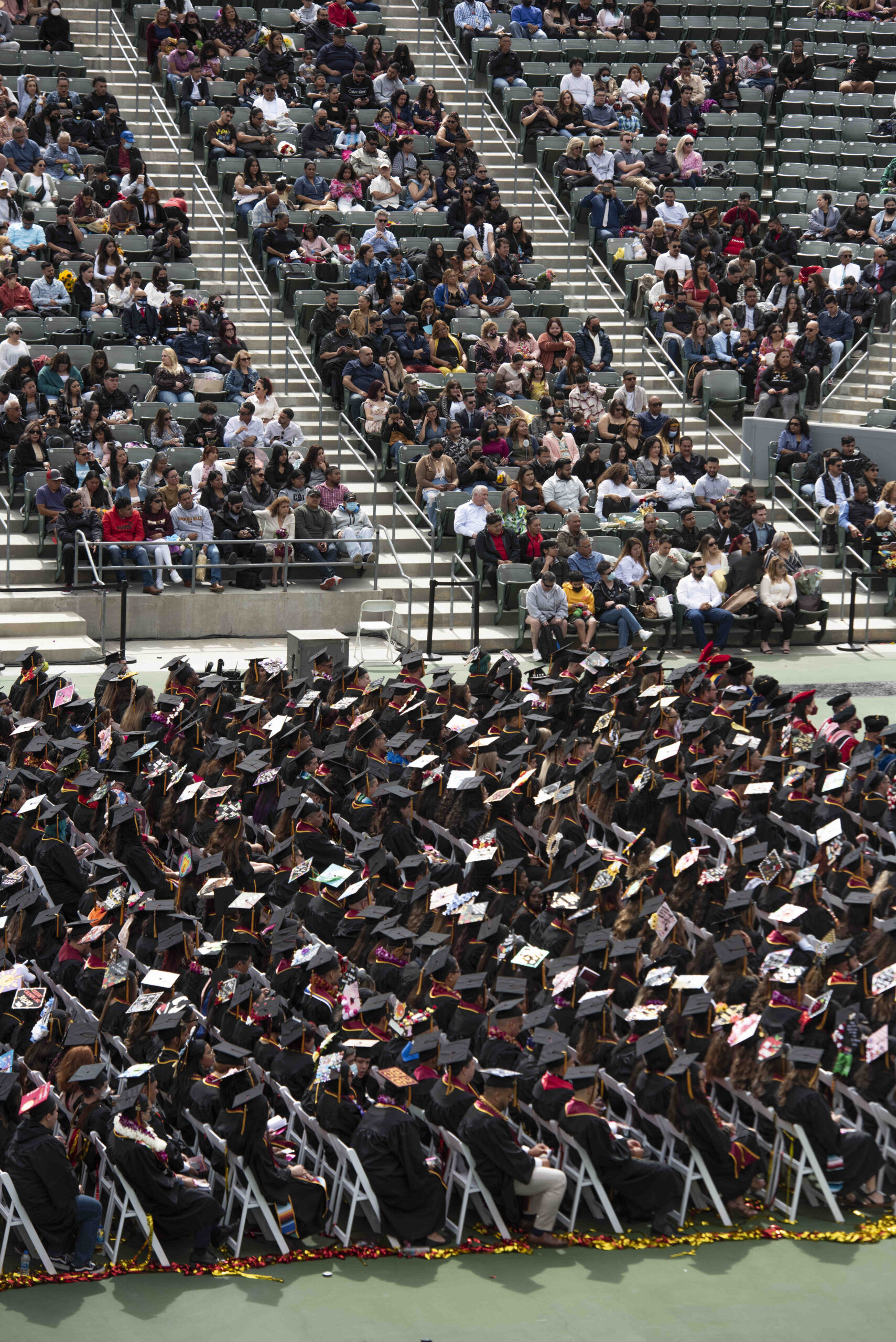 Graduates and commencement audience
