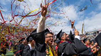 Graduates celebrate with streamers