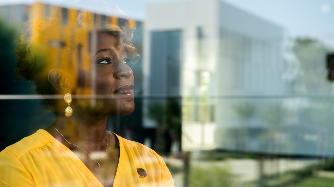 Bobbie Porter's reflection in a window.