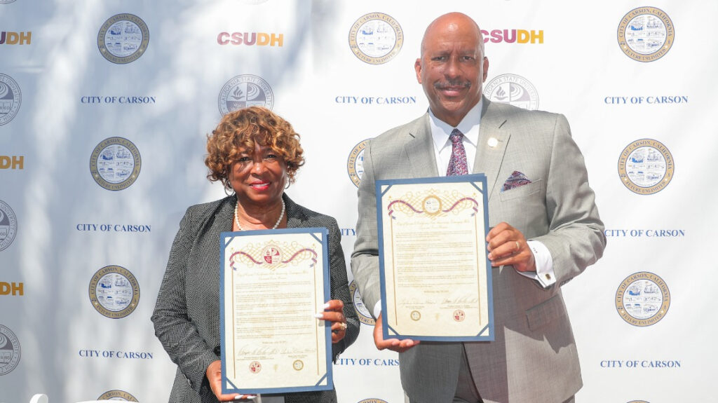 Lula Davis-Holmes and President Parham at the Memorandum of Understanding signing between CSUDH and the City of Carson in July 2021.