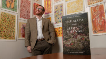 Ken Seligson with The Maya and Climate Change book in foreground