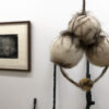 View of Insistent exhibition, with framed print and needle felted wool works