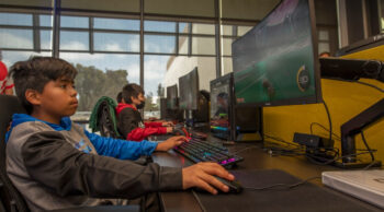 Compton Unified student gaming at the esports event