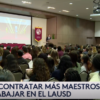 Still from Univision footage of COE ceremony Text: Buscan contratar más maestros para trabajar en el LAUSD