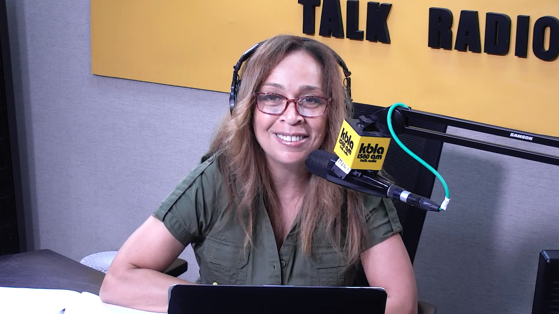 Dominique DiPrima in the radio studio