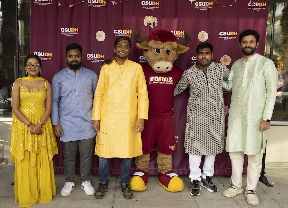 Students with Teddy Toro at Diwali celebration