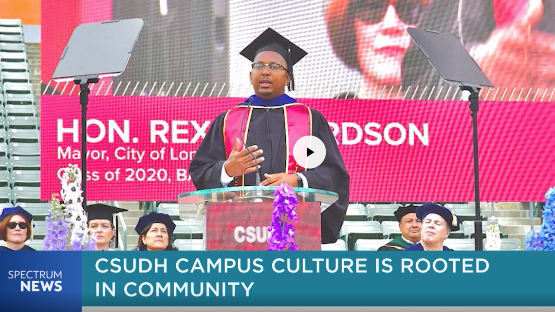 Rex Richardson speaking at CSUDH commencement ceremony, with caption "CSUDH Campus Culture is Rooted in Community" and Spectrum News logo