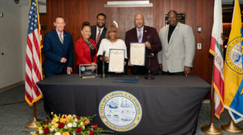 Mayor of Carson Lula Davis-Holmes and CSUDH President Thomas A. Parham with members of Carson City Council