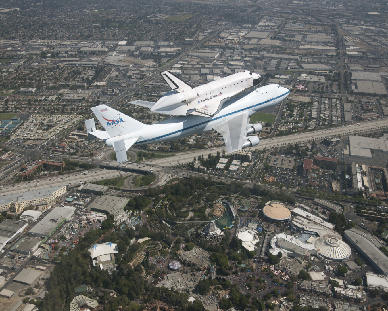 space shuttle over Disneyland