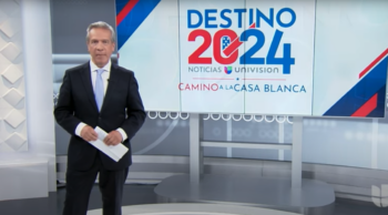 Univision anchor in front of sign reading "Destino 2024"