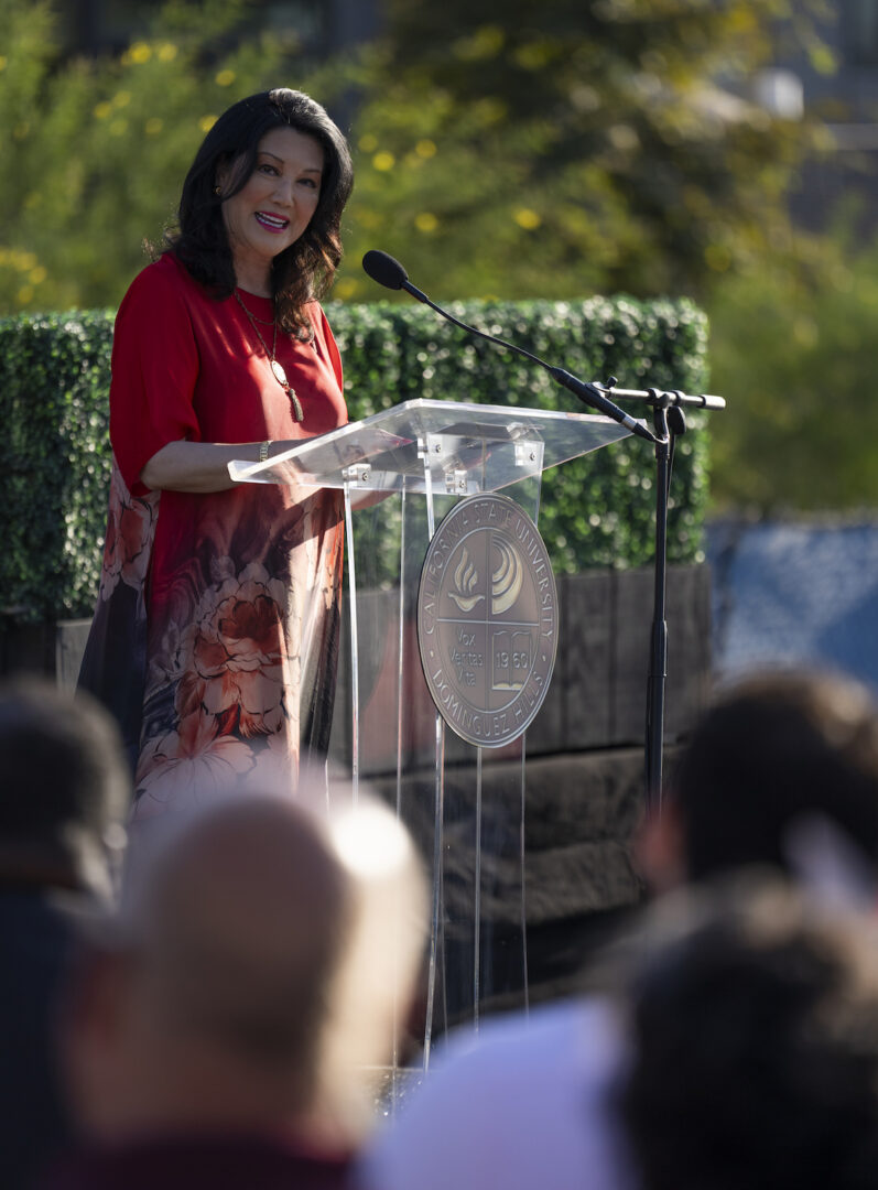 CSU Trustee Wenda Fong speaking at CSUDH podium