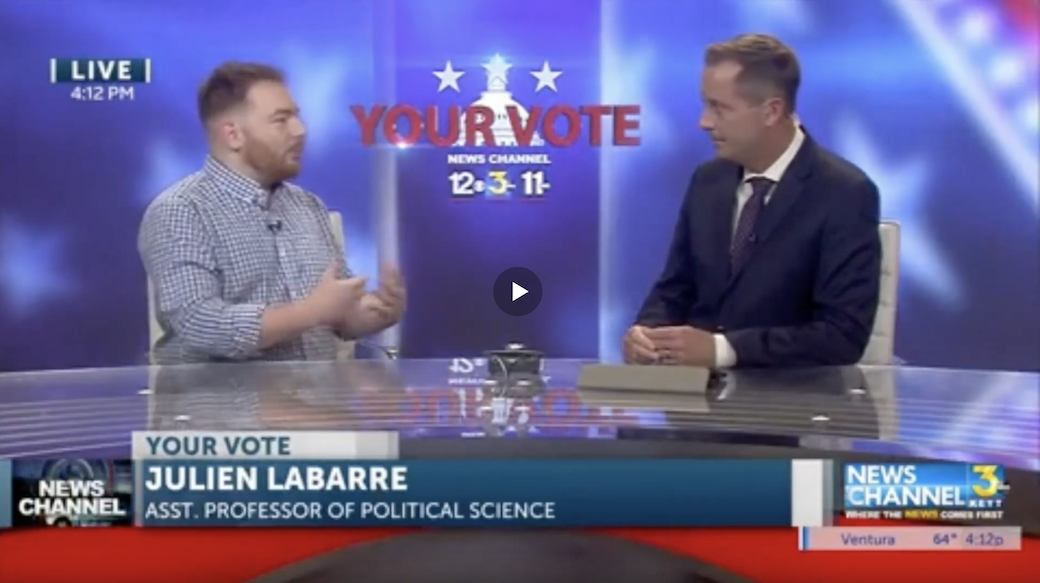 Still of Professor Labarre in news studio with anchor