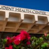 CSUDH Student Health Center with flowers in the foreground