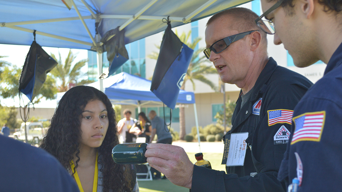 Students learn about careers at Marathon Petroleum during the EXP career fair at CSUDH.