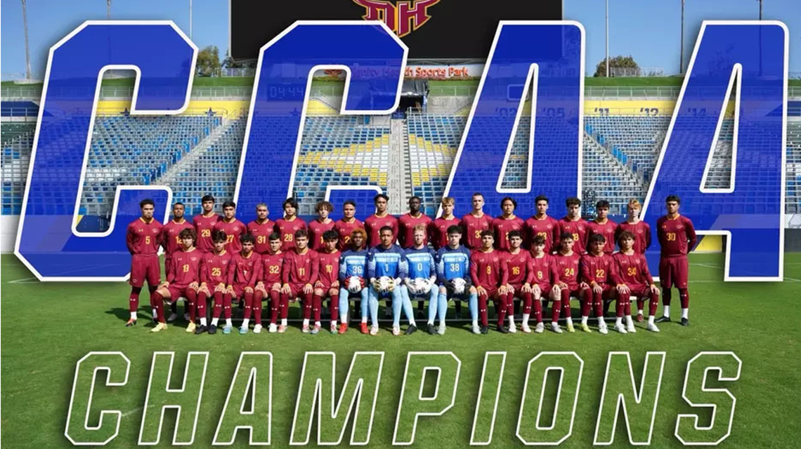 Group photo of CSUDH's men's soccer team after winning CCAA tournament.