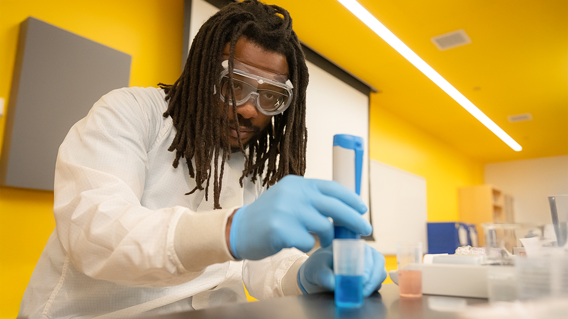 A professor in a laboratory on the CSUDH campus.