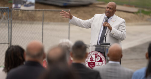 CSUDH President Parham speaking at a university podium