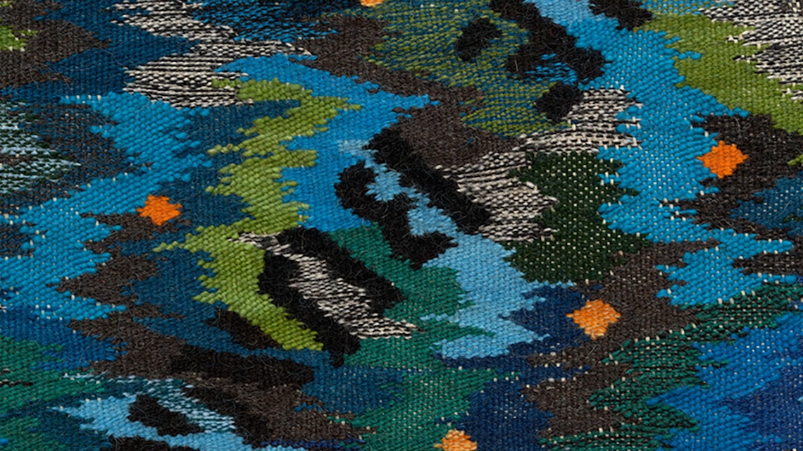 Close, zoomed-in image of colorful textile 