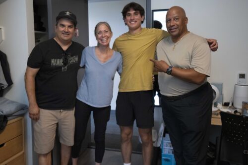 President Parham with a family on move-in day.