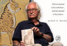 CSUDH Emeritus Professor of Anthropology Jerry Moore and his book "Cat Tales."