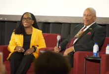 Justice Jackson and President Parham smiling onstage