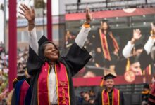 Graduate onstage at Commencement